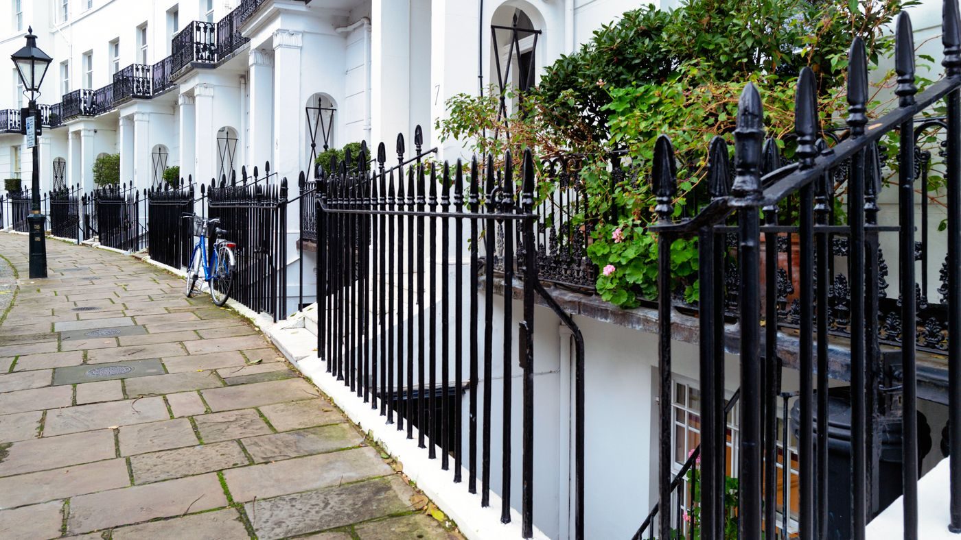 Georgian townhouses with black iron railings in Kensington, west London